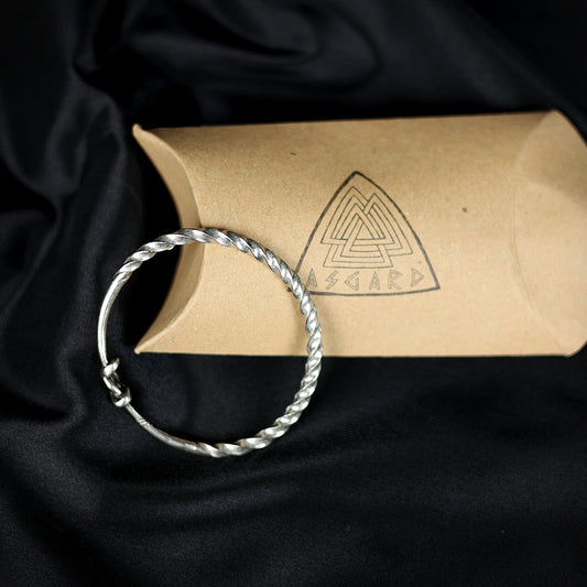 Twisted pewter arm ring (Viking Age replica)